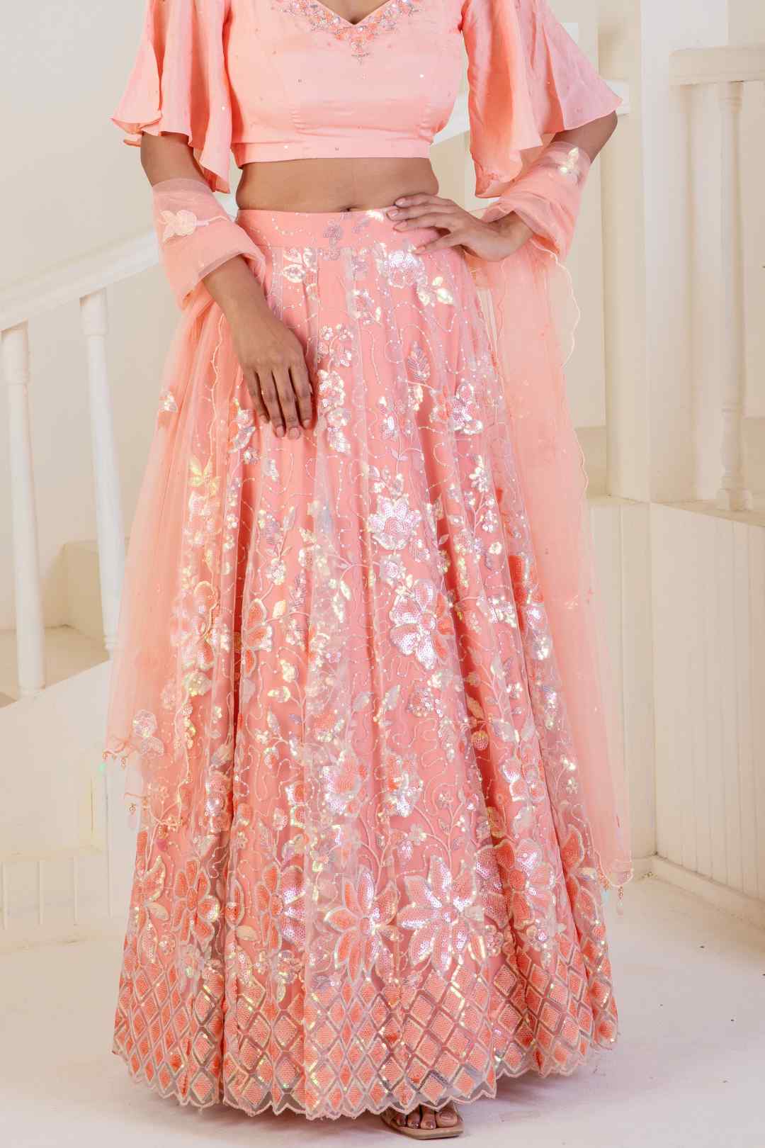 Adorned with delicate sparkly embroidery legenga