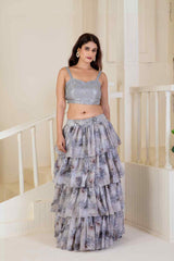 Grey skirt paired with a sequined blouse