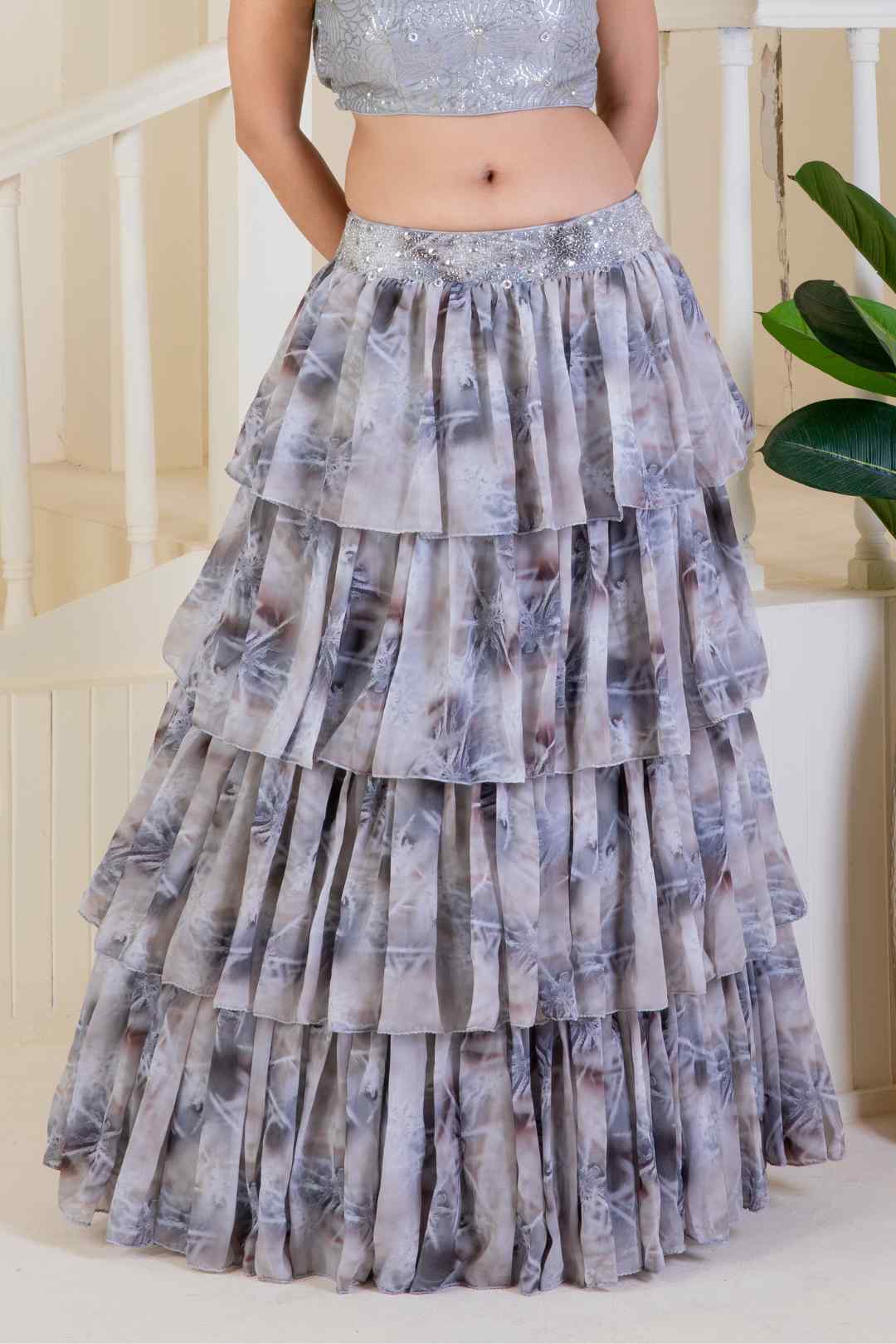 Grey skirt paired with a sequined blouse