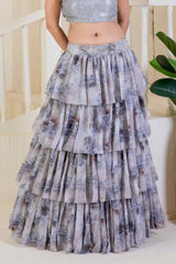 Grey skirt paired with a sequined blouse