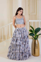 Grey skirt paired with a sequined blouse